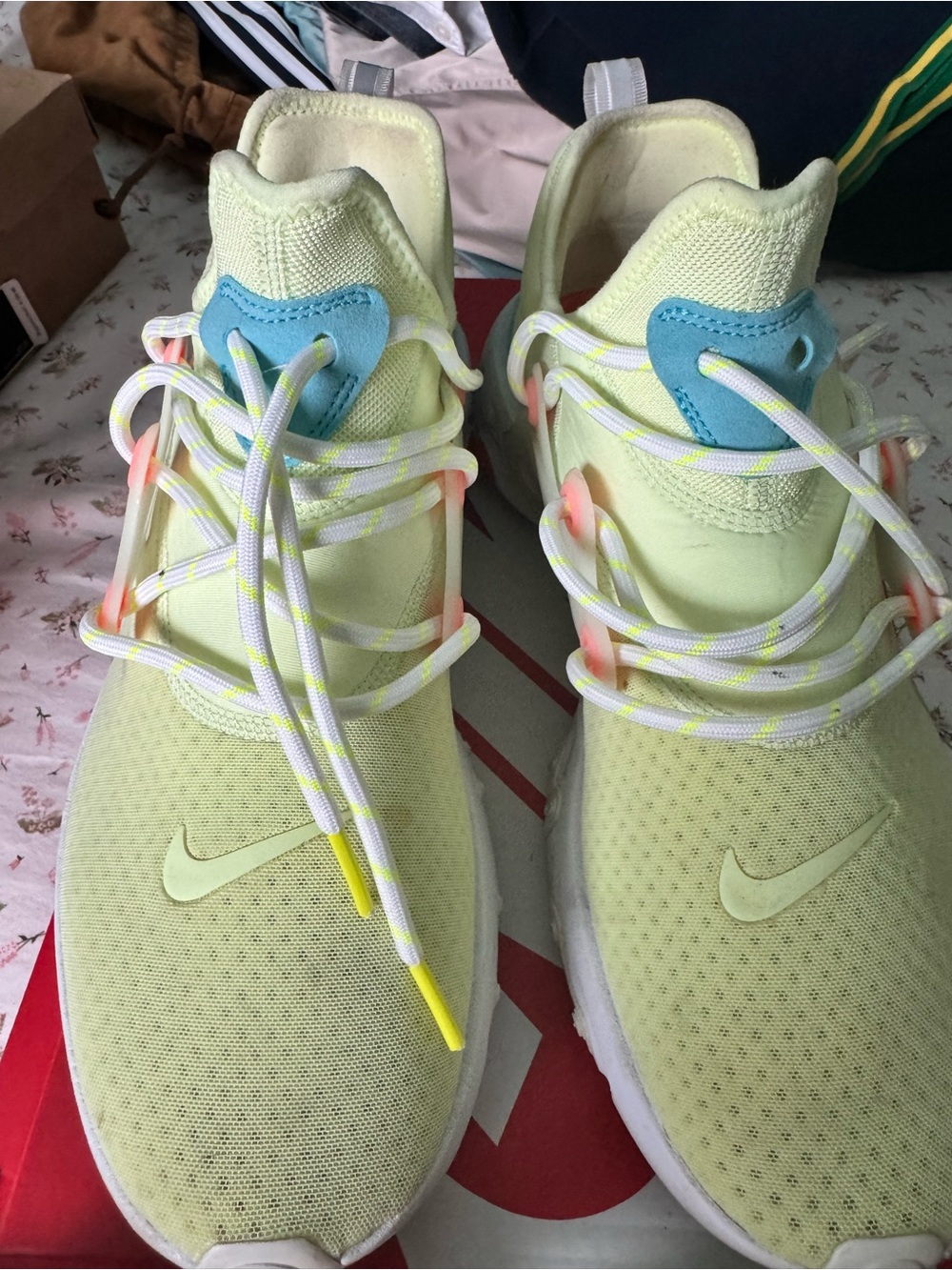 Nike Yellow Knit Athletic Sneakers with Blue Tongue Accents